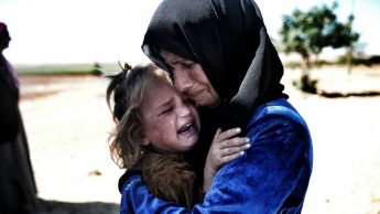 A woman and a child crying