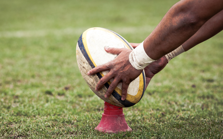 Generic image: rugby player holding down a rugby ball