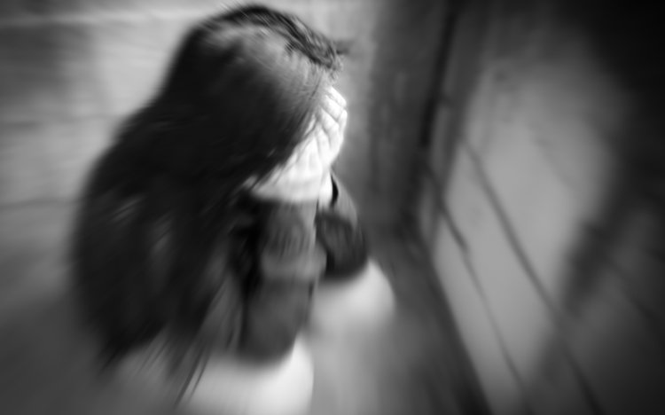 Trafficking in human, woman in dispair 