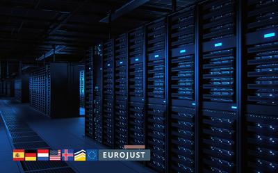 server room, magnet with flags of spain, netherlands, usa, iceland, germany and logos of europol and eurojust